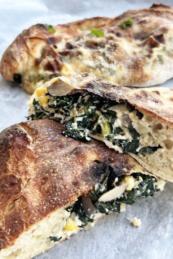 California Cheesy Calzone recipe. This is a perfect comfort food recipe, dinner idea, or part food recipe. Kale, jalapeño, Monterey jack cheese, and pizza dough make this calzone tasty. Happy Cooking! www.chophappy.com #calzone #easyrecipe