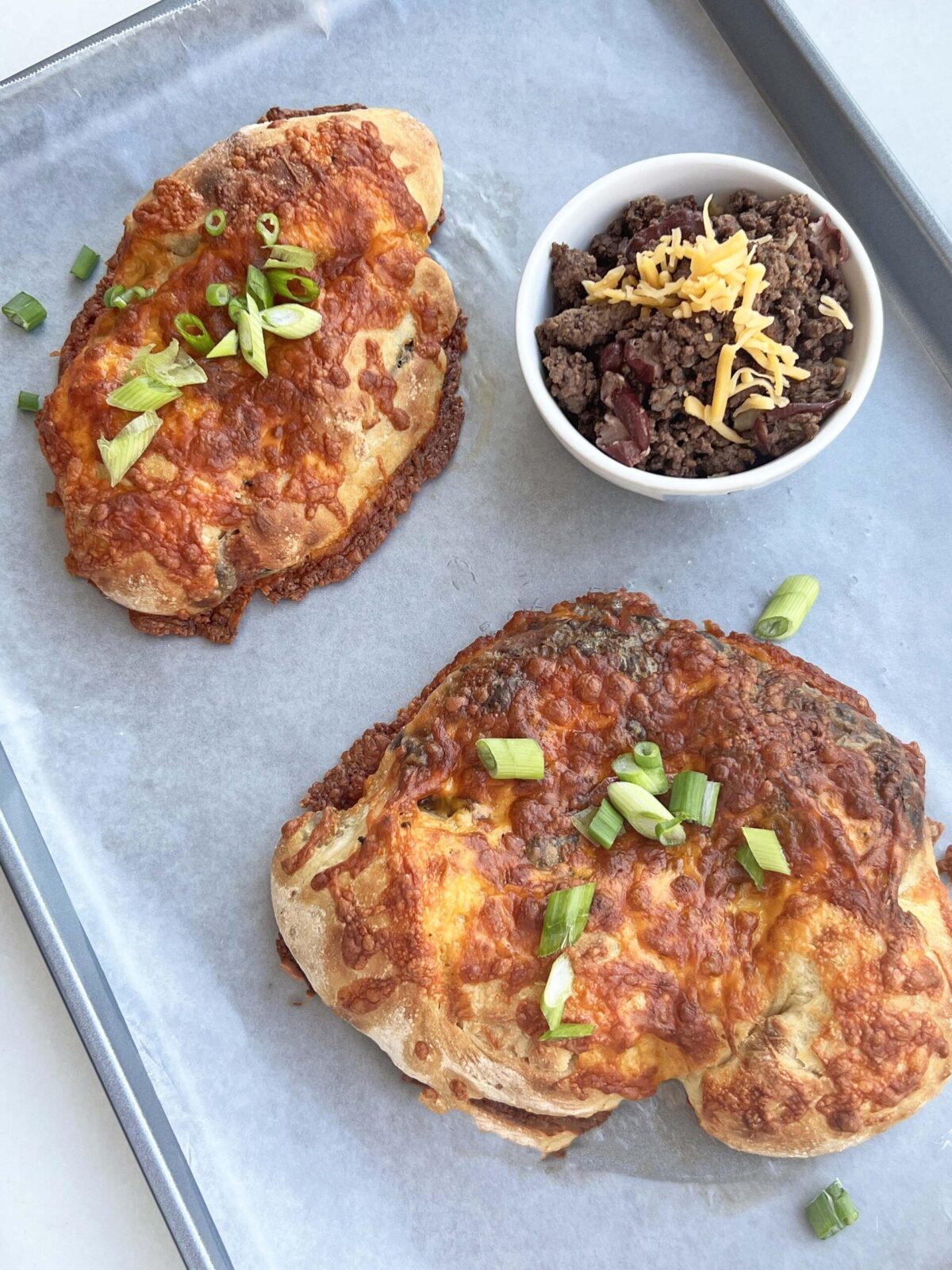 Cincinnati Chilli Calzone. This is in honor of the bangles going to the super bowl. This is a take on Cincinnati Chili. www.ChopHappy.com #chili #calzone