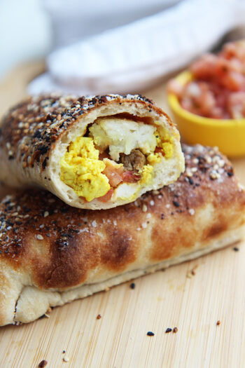 How to Make a Bagel Burrito (Breakfast Burrito). This is the prefect meal prep recipe for a busy weeknight dinner. Also, very budget friendly meal if you use the leftovers in your fridge. www.ChopHappy.com #breakfastburrito #bagelsandwichrecipe